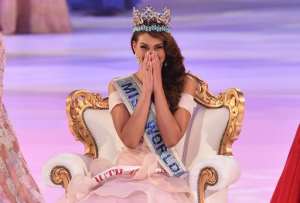 Miss South Africa and 2014 Miss World Rolene Strauss reacts after being crowned during the grand final of the Miss World 2014 pageant in London on December 14, 2014.  By Leon Neal AFP