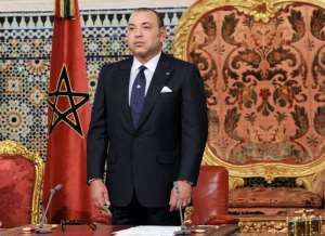 A handout picture from the Moroccan Royal Palace shows Morocco's King Mohammed VI giving a speech in Rabat on August 20, 2013.  By Azzouz Boukallouch Moroccan Royal PalaceAFPFile