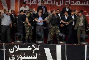 Morsi praised Egypt's Muslims and Christians alike.  By Mohammed Hossam AFP