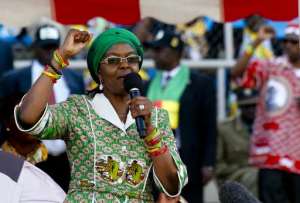 Grace Mugabe raises her fist as she addresses a rally in Harare on July 28, 2013.  By Alexander Joe AFPFile