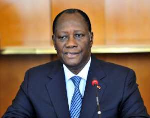 Ivory Coast's President Alassane Ouattara took the crucial post of defence minister in a new government.  By Sia Kambou AFPFile