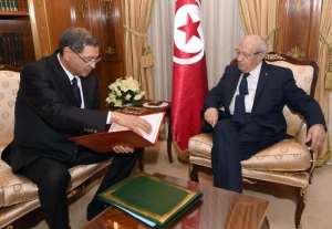 Tunisia's nominated Prime Minister Habib Essid L presents his cabinet to Tunisian President Beji Caid Essebsi on January 23, 2015 in Carthage Palace in Tunis.  By Fethi Belaid AFPFile