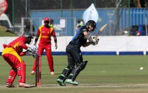 New Zealand's batsman Tom Latham R prepares to play a shot during the second one-day international between Zimbabwe and New Zealand at Harare Sports Club on August 4, 2015.  By Jekesai Nijikizana AFP