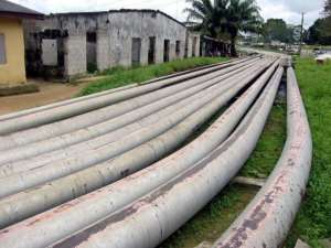 Oil pipelines are seen running through Okrika, a town in the Niger Delta, in 2004.  By Pius Utomi Ekpei (AFP/File)