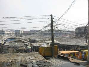 A scramble of power cables in the Oshodi district of Lagos.  By Pius Utomi Ekpei AFPFile