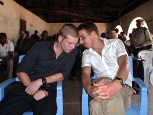 Joshua French (L) and Tjostolv Moland pictured in the military court of Kisangani in June 2010.  By  (AFP/File)