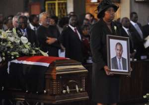 Kenyas Internal Security Minister George Saitotis casket, on June 15, 2012 in Nairobi during a funeral mass. By Simon Maina (AFP/File)