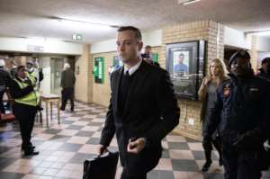 South African Paralympian Oscar Pistorius arrives at the Pretoria High Court on June 14, 2016 on the second day of his sentencing hearing.  By Gianluigi Guercia AFP