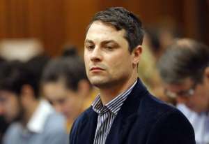 Carl Pistorius attends the trial of his brother in Pretoria, South Africa, on March 4, 2014.  By Kim Ludbrook POOLAFPFile