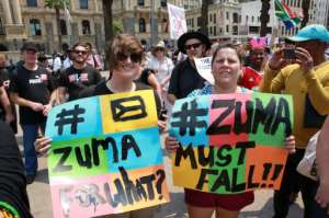 ZUMAMUSTFALL supporters and campaigners demonstrate against South African President Jacob Zuma on February 11, 2016 in Cape Town, South Africa few hours ahead of his State of the Nation address.  By Nardus Engelbrecht AFP