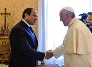 Pope Francis R shakes hands with Egyptian President Abdel Fattah al-Sisi prior to their meeting at the Vatican on November 24, 2014.  By Gabriel Bouys AFP