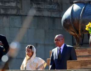 Indian President Pratibha Patil L walks with South Africa President Jacob Zuma R.  By Alexander Joe AFPFile