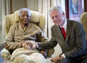 Nelson Mandela was arrested as a young liberation fighter on August 5, 1962, near the town of Howick.  By Barbara Kinney (AFP/CLINTON FOUNDATION/File)
