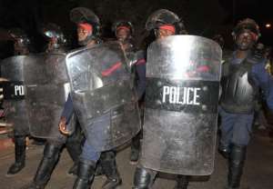 Police block youths in Dakar on Tuesday night.  By Seyllou AFPFile