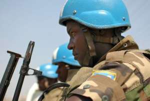 File picture shows UN peacekeepers patrolling in Bor, a strategic town recaptured from rebel forces loyal to deposed vice president Riek Machar, on January 18, 2014.  By Charles Lomodong AFPFile