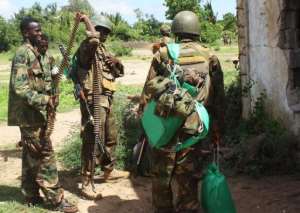 Soldiers of the African Union Mission in Somalia patrol in Afgoye district.  By Abdurashid Abdulle (AFP)