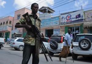 Somali federal government forces patrol a street of Mogadishu on February 18, 2015.  By Mohamed Abdiwahab AFPFile