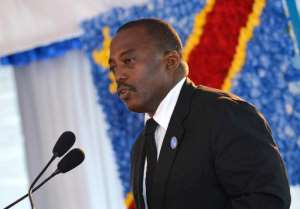 DR Congo President Joseph Kabila speaks at the heads of state meeting of the Common Market for Eastern and Southern Africa in Kinshasa on February 26, 2014.  By Junior D.Kannah AFPFile