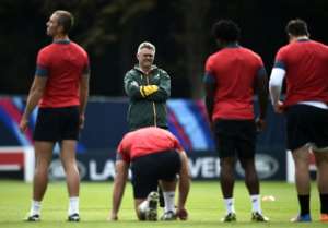 South Africa's head coach Heyneke Meyer leads a team training session at the Pennyhill park hotel in Bagshot, on October 13, 2015 during the 2015 Rugby World Cup.  By Lionel Bonaventure AFP