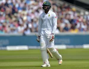 South Africa's Kagiso Rabada leaves the field after losing his wicket for 28 on the third day of their first Test match against England, at Lord's Cricket Ground in London, on July 8, 2017.  By OLLY GREENWOOD AFPFile