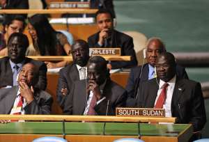 The South Sudan delegation are seen after the United Nations General Assembly voted to admit the newly formed nation.  By Stan Honda (AFP)