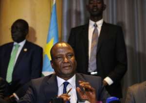 Newly appointed South Sudan First Vice President, Taban Deng Gai centre speaks during a press conference in the Kenyan capital, Nairobi on August 17, 2016.  By Tony Karumba AFPFile