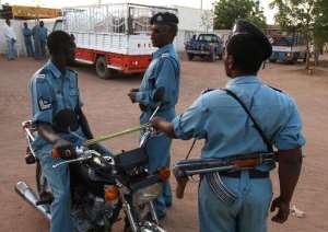 Sudanese police officers stand guard in Khartoum on April 10, 2010.  By Patrick Baz AFPFile