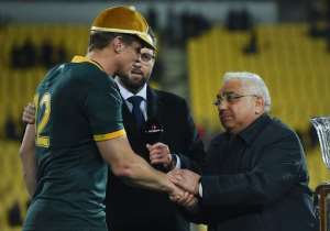 South Africa's captain Jean de Villiers L receives a cap for his 100th Test match, during their Rugby Championship Test against New Zealand, at Westpac Stadium in Wellington, on September 13, 2014.  By Marty Melville AFP