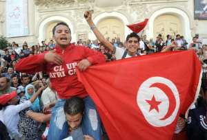 Tunisian protesters shout anti-government slogans during a  demonstration in Tunis on October 23, 2013.  By Fethi Belaid AFPFile
