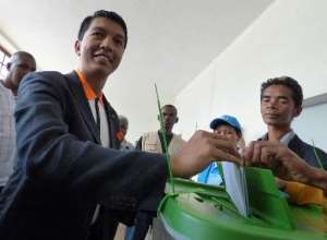 Madagascar's President Andry Rajoelina casts his ballot in a polling station during the presidential election on December 20, 2013 in Antananarivo, Madagascar.  By Tsiresena Manjakahery AFPFile