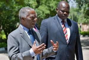 Chief mediator Thabo Mbeki (L) and Pagan Amum (R) Secretary General of the SPLM. By Giulio Petrocco (AFP/File)