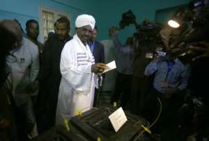 Sudan'sPresident Omar al-Bashir C casts his vote in the presidential elections at a polling station in the Saint Francis school in the capital, Khartoum, on April 13, 2015.  By Ashraf Shazly AFPFile