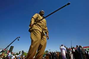 Sudan's President Omar al-Bashir appears during a rally with his supporters in Khartoum on January 9, 2019 as protests calling for an end to his three decades in power rock the country.  By ASHRAF SHAZLY AFPFile