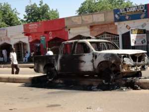 A pickup truck burnt by members of the Boko Haram Islamist sect in Damaturu.  By Aminu Abubakar AFPFile