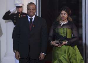 King Mswati III of Swaziland and his wife arrive at the White House during the US Africa Leaders Summit on August 5, 2014 in Washington, DC.  By Brendan Smialowski AFPFile