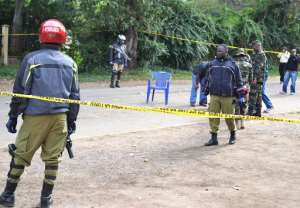 File photo shows police cordoning off the site of a bomb attack in Arusha, northern Tanzania on July 8, 2014.  By  AFPFile