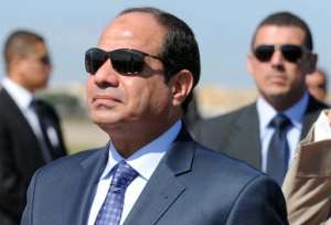 Egypt's president Abdel Fattah al-Sisi reviews troops upon his arrival at Houari-Boumediene International Airport on June 25, 2014 in Algiers.  By Farouk Batiche AFPFile