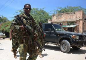 File picture shows Somali soldiers on patrol in the Wadajir district south of capital Mogadishu on August 15, 2014.  By Mohamed Abdiwahab AFPFile