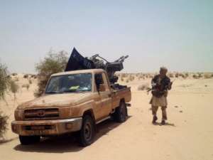 An Islamists rebel of Ansar Dine is pictured in April, near Timbuktu.  By Romaric Ollo Hien (AFP/File)