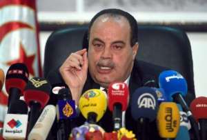 Tunisian Interior Minister Mohamed Najem Gharsalli speaks with journalists during a press conference on March 26, 2015 in Tunis.  By Fethi Belaid AFPFile