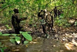 Ugandan soldiers patrol through the jungle in the Central African Republic in April 2012.  By  (AFP/File)