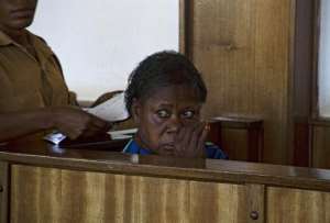 Ugandan nurse Rosemary Namubiru sits in the dock at the Buganda Road Magistrates Court on May 19, 2014 in Kampala.  By Isaac Kasamani AFPFile