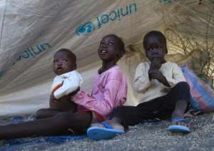 South Sudanese refugee children are seen at a camp run by the Sudanese Red Crescent on January 27, 2014 in the western part of Sudan's White Nile state, about 30 kilometres from South Sudan.  By Ashraf Shazly AFP