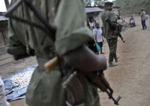 Democratic Forces for the Liberation of Rwanda FDLR soldiers patrol on November 27, 2008 in Lushebere, eastern Democratic Republic of Congo.  By Tony Karumba AFPFile
