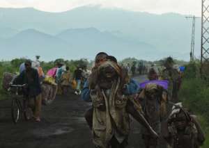 Congolese people flee from Sake on November 23, 2012 to escape a rebel advance in eastern DR Congo.  By Tony Karumba AFPFile