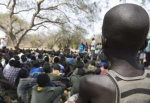 Young boys, child soldiers attend on February 10, 2015, a ceremony of the child soldiers disarmament, demobilisation and reintegration in Pibor, South Sudan.  By Charles Lomodong AFPFile