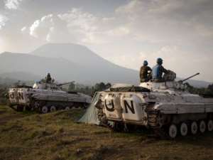 Soldiers with the United Nations mission in Democratic Republic of Congo MONUSCO sit on top of tanks at a military post in Kibati on August 13, 2012.  By Michele Sibiloni AFPFile