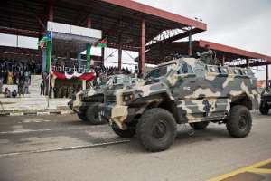 South Sudanese soldiers drive armoured personel carriers in Juba on May 16, 2014.  By Charles Lomodong AFPFile