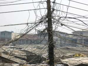 A scramble of power cables seen in Oshodi district of Lagos, Nigeria, on April 16, 2003.  By Pius Utomi Ekpei AFPFile