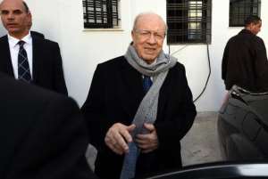 Anti-Islamist Beji Caid Essebsi, named as the winner in Tunisia's first free presidential election, arrives at his party's headquarters on December 22, 2014 in Tunis.  By Fethi Belaid AFP